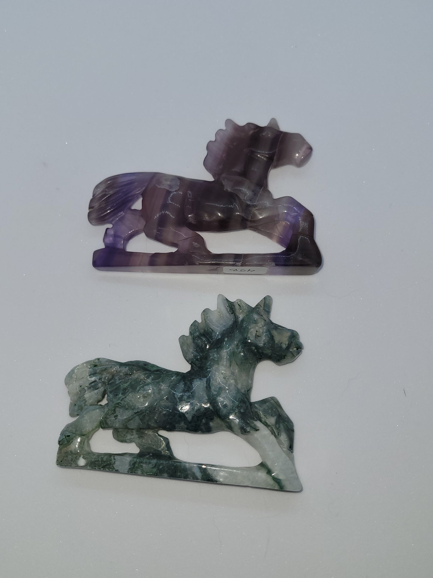 Running Unicorn carvings